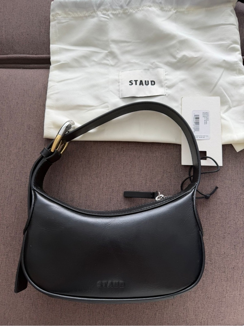 STAUD Black Leather Crescent Shoulder Bag with Gold Accent